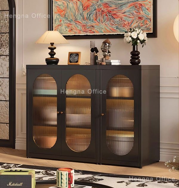 Vintage black steel sideboard with arched fluted glass doors showing interior shelving